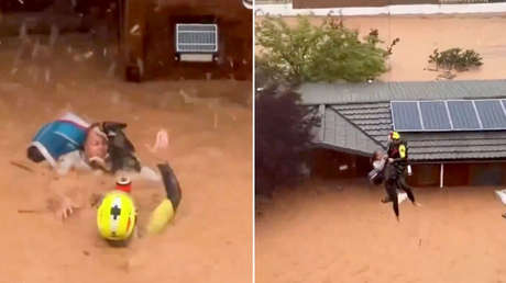 Dramático rescate de una mujer y sus mascotas atrapados con el agua hasta el cuello en Valencia (VIDEO)